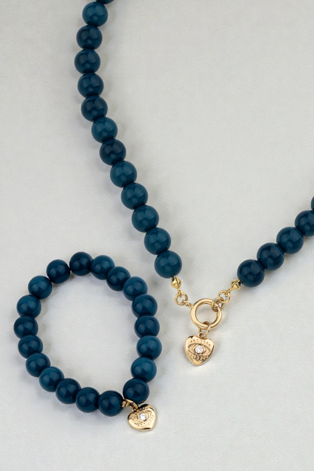 סט לארה כחול עם תליון לב