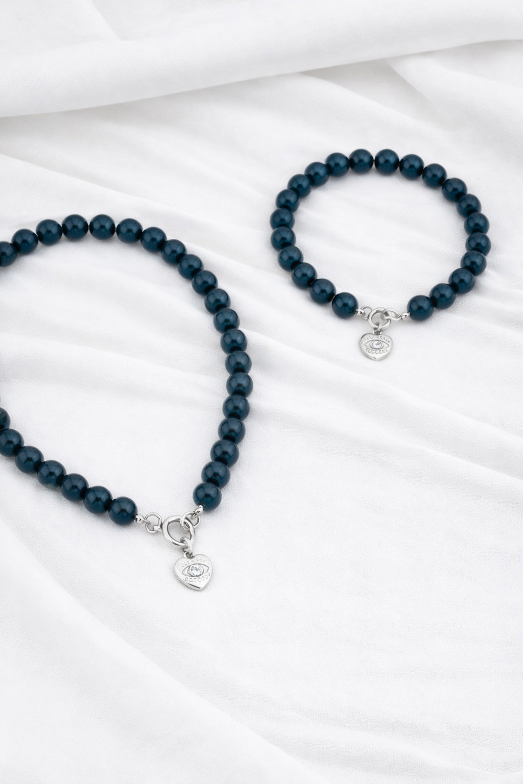 סט לארה כחול עם תליון לב