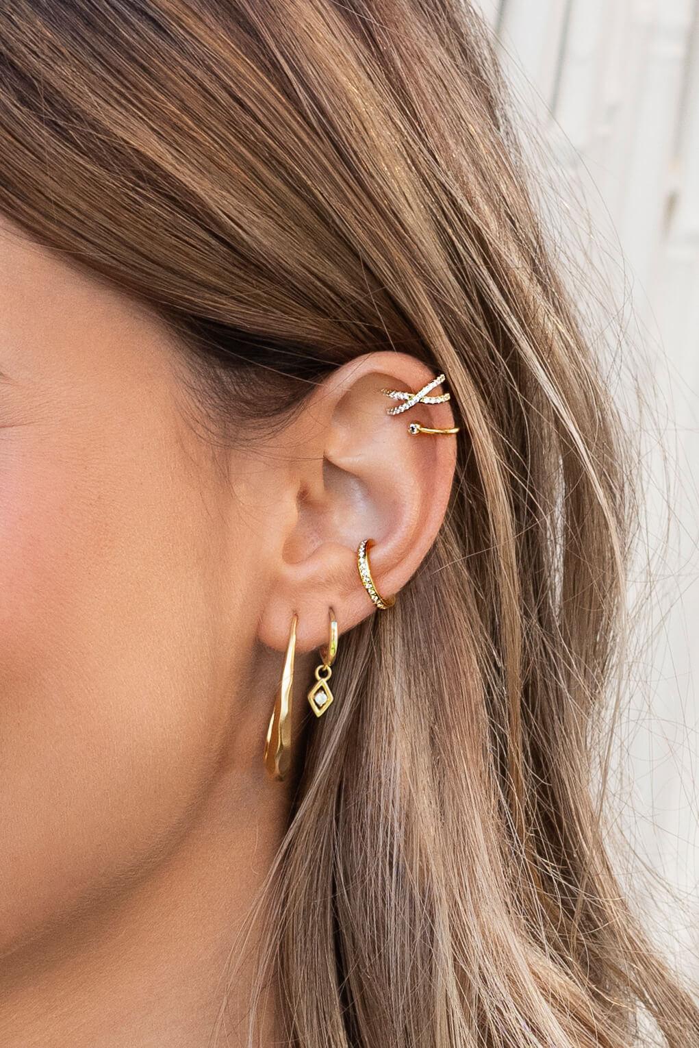 x earring