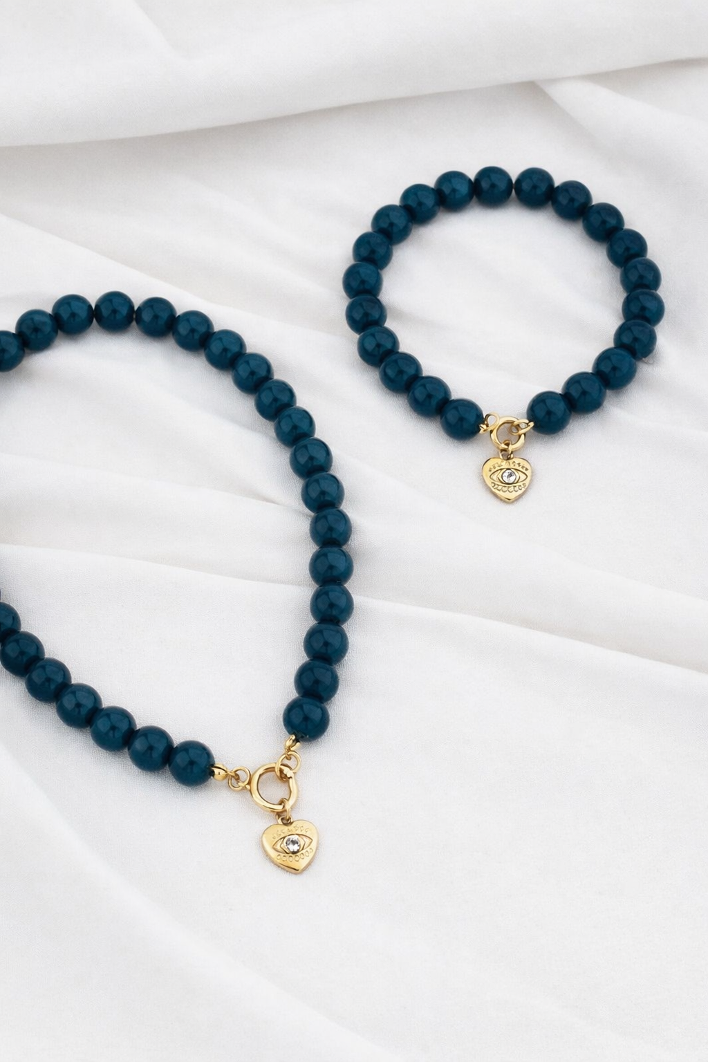 סט לארה כחול עם תליון לב